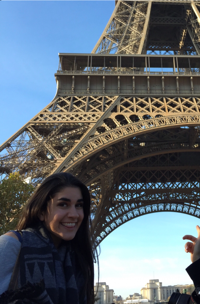 Olivia in front of the Eiffel Tower